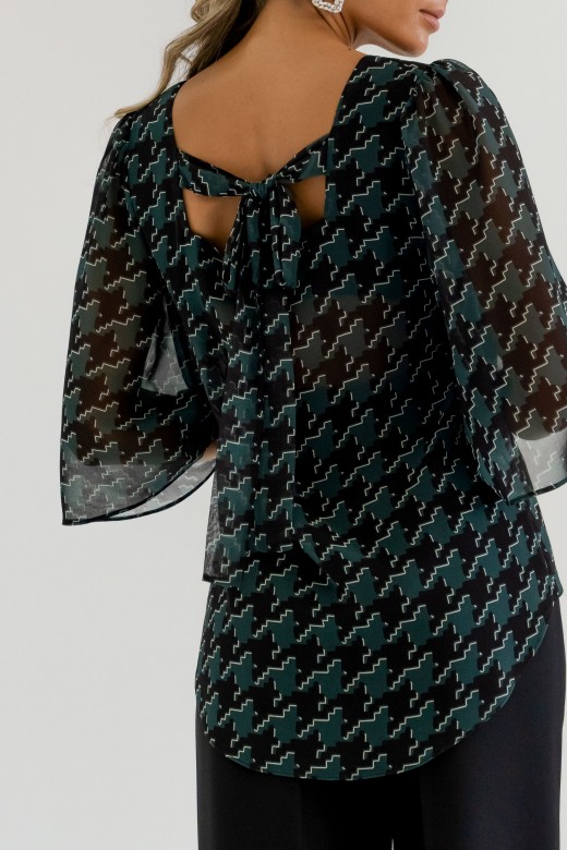 Fluid asymmetrical tunic with geometric pattern