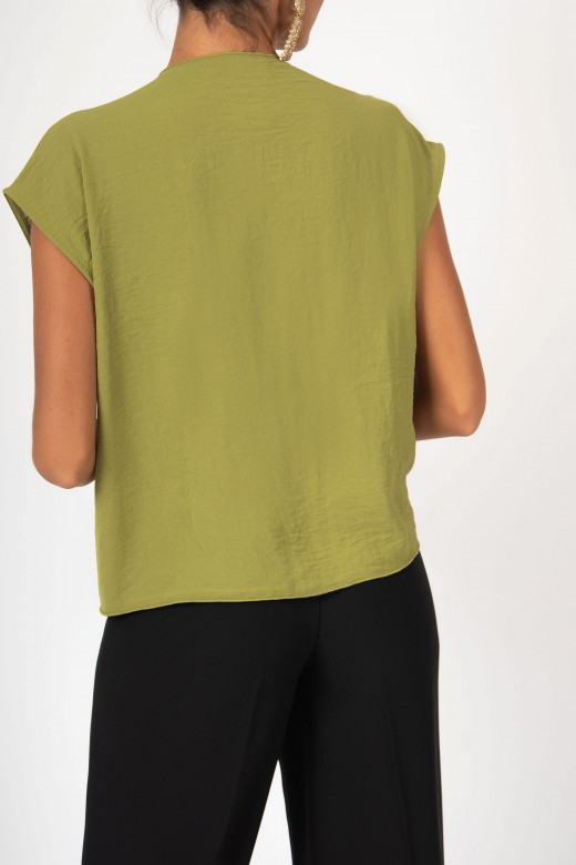 Asymmetrical blouse with knot detail