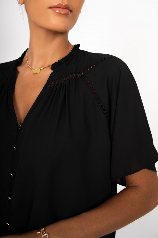Perforated blouse with ruffles