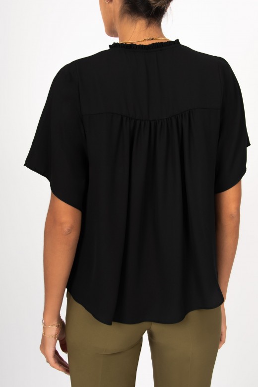 Perforated blouse with ruffles
