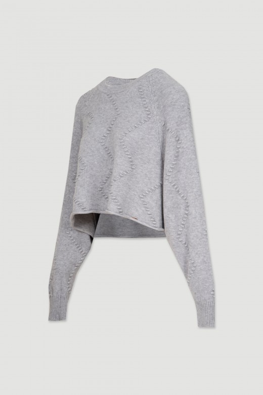 Pull court en maille relief