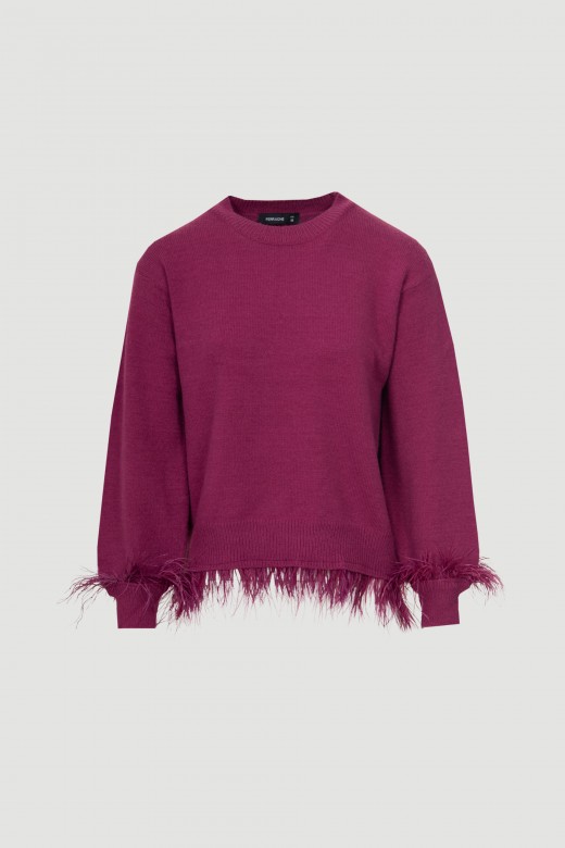Knit sweater with feathers