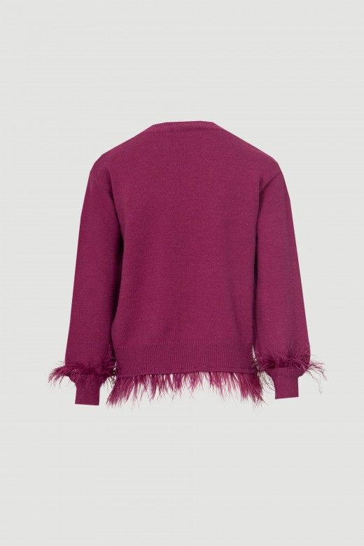 Knit sweater with feathers