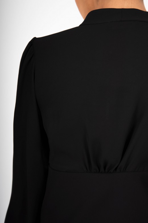 Cropped blouse with pleats and puff sleeves