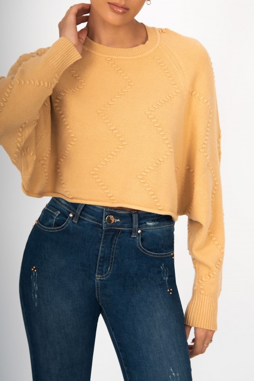 Cropped knit sweater relief