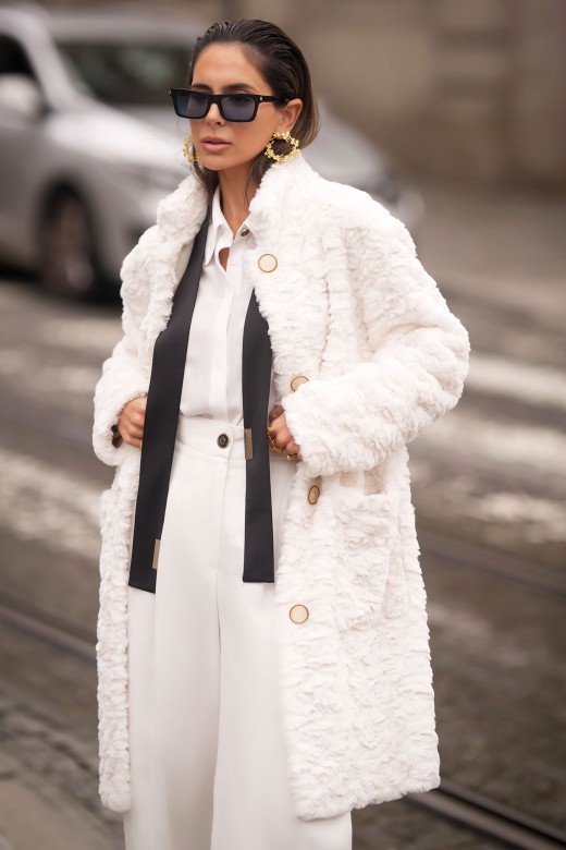 Fur coat with pockets