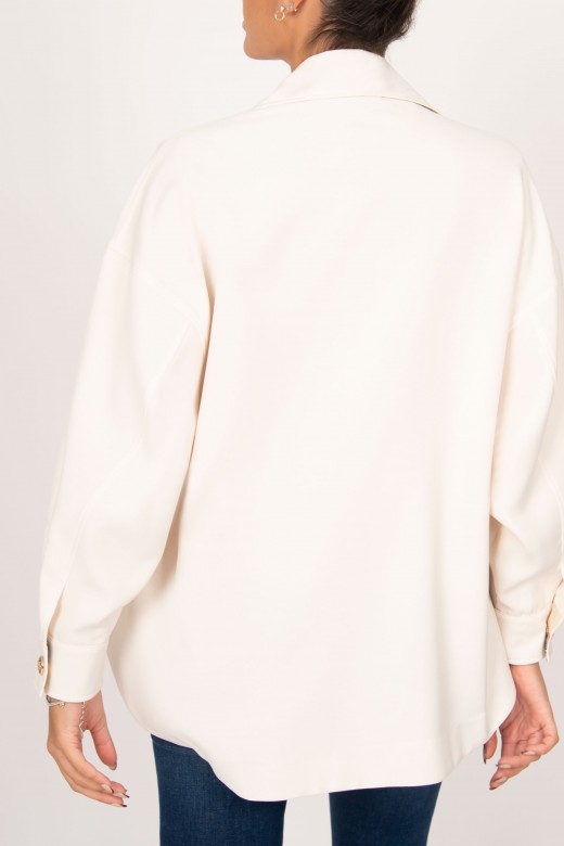 Asymmetrical shirt with puffed sleeves