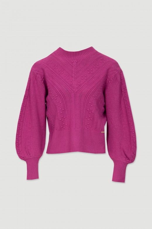 Knit sweater with reliefs and perforations