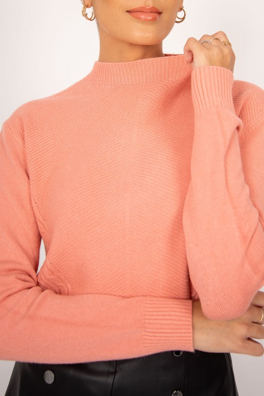 Knit sweater with side braided reliefs