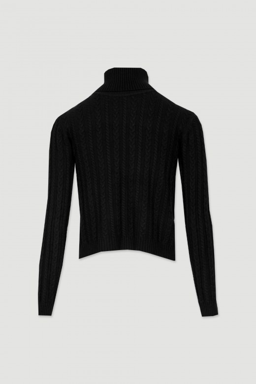 Fitted knit sweater with braided reliefs