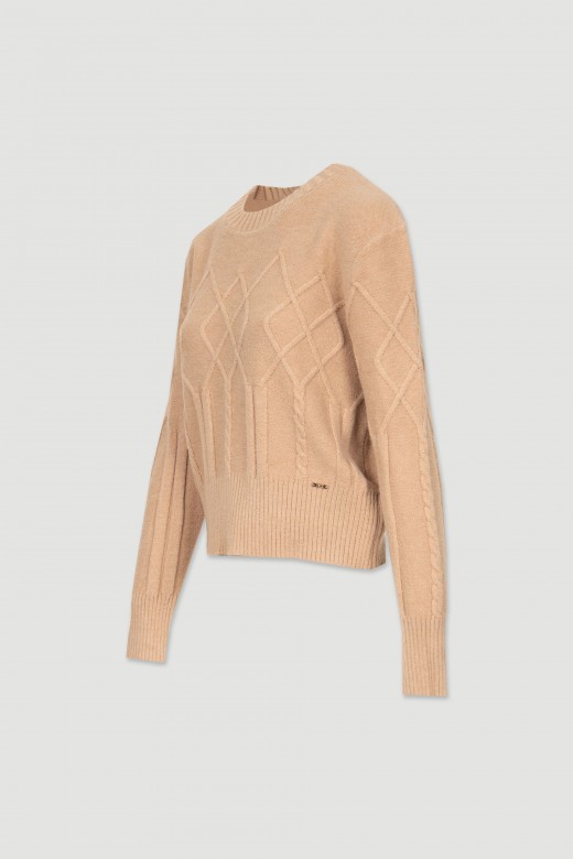 Knit sweater with reliefs