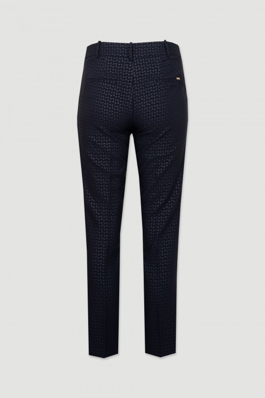 Textured pants pockets with flaps