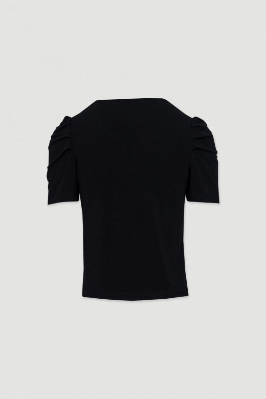 Shirt with pleats