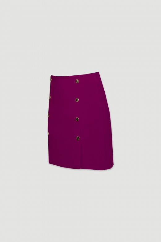 Short skirt with custom buttons embellishment