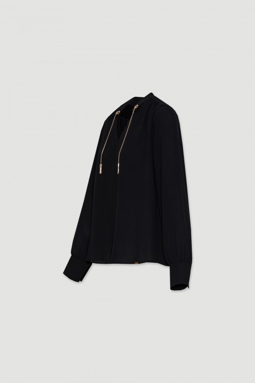 Flowy blouse with chain embellishments