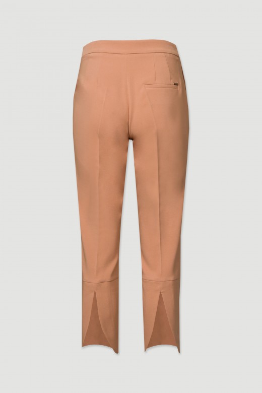 Classic trousers with a slit at the back