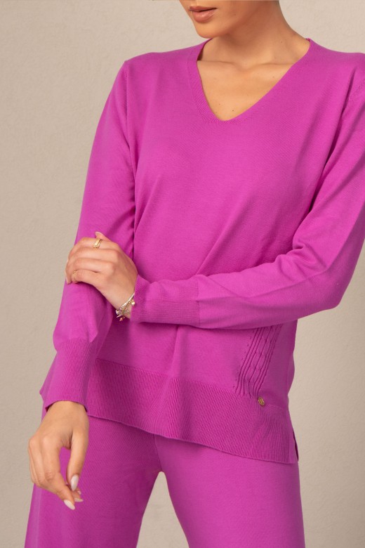 Knit tunic with textured effect on the side