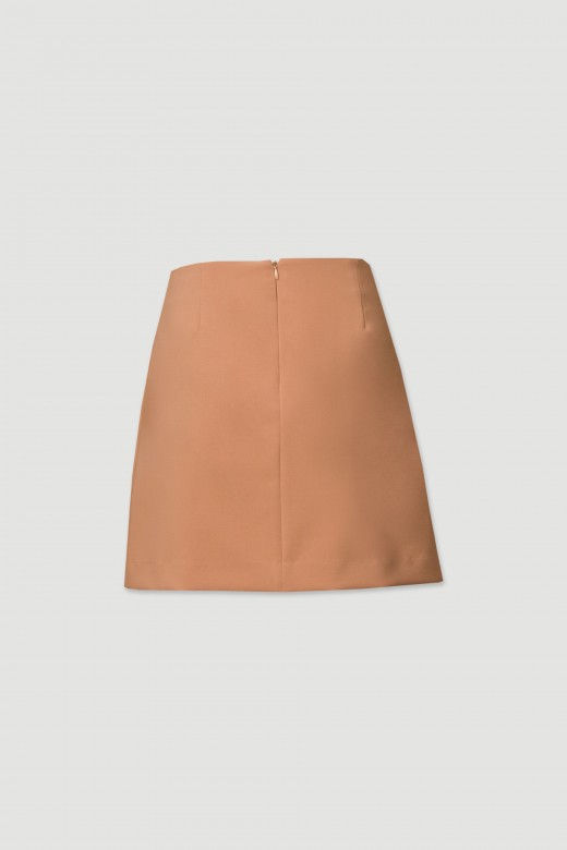 Short skirt with button detailing at the front