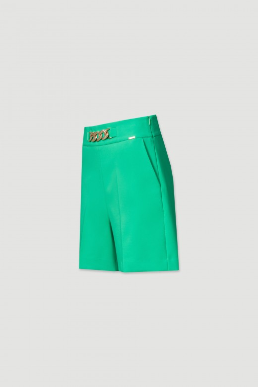 Shorts with metal application