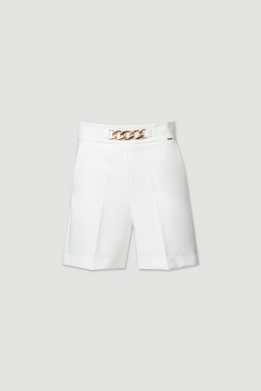 Shorts with metal application