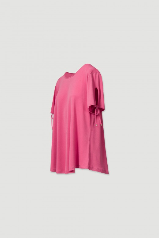 Tunic with drawstring closure on the sleeves