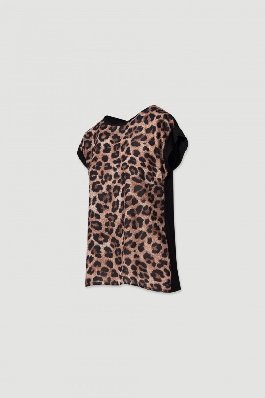 Top with animal print on the front