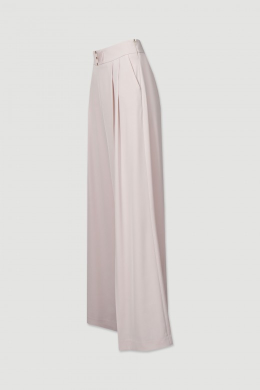 Wide-leg trousers with pleats at the front