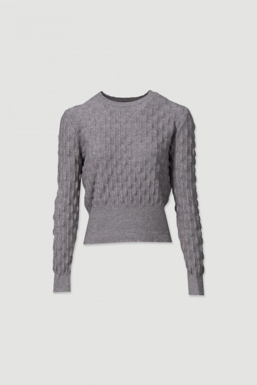 Knitted sweater with intricate detailing