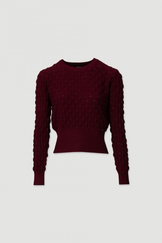 Knitted sweater with intricate detailing