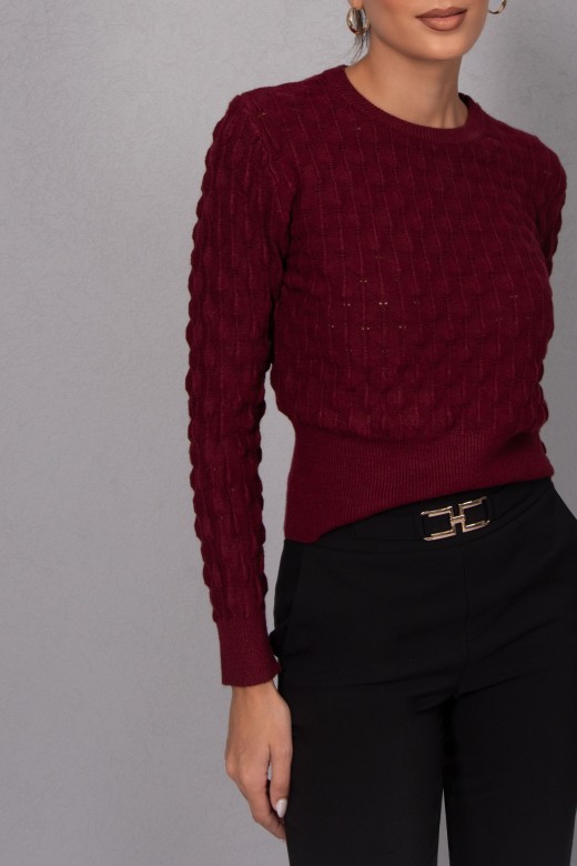 Knitted sweater with intricate detailing