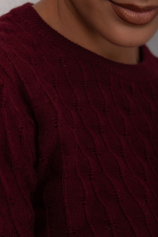 Knitted sweater with intricate detailing