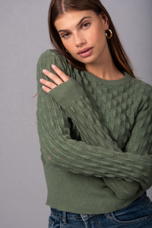 Knitted sweater with intricate detailing