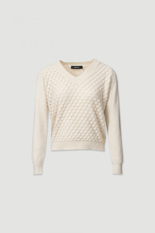 Knitted sweater with a v-neckline