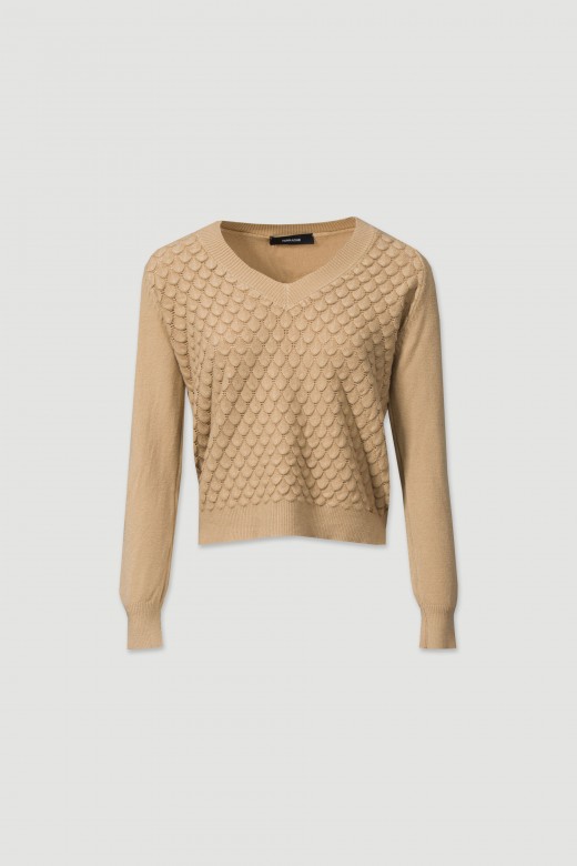 Knitted sweater with a v-neckline