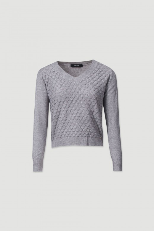 Knitted sweater with a v-neckline