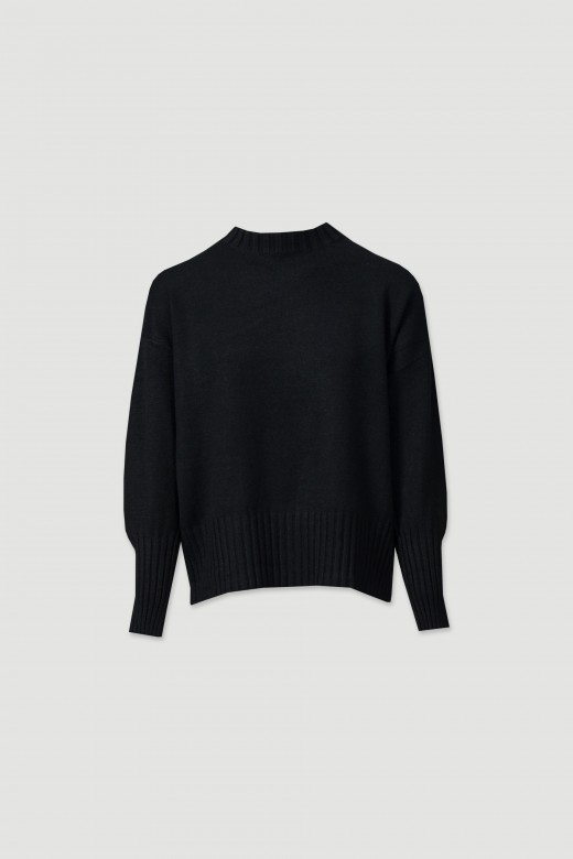 Pull en maille avec poignet haut.