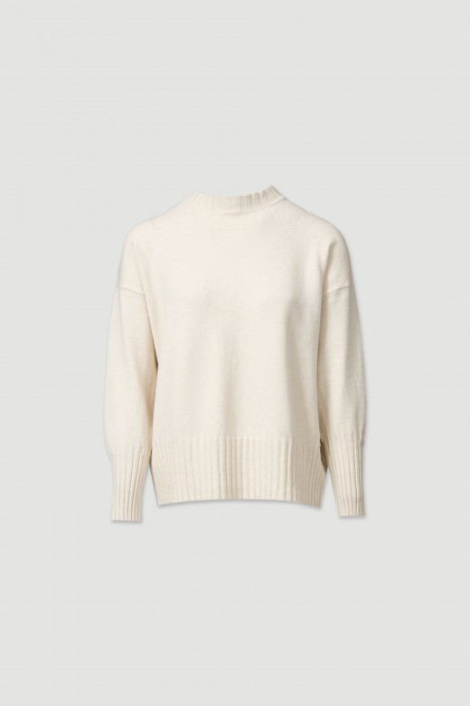 Pull en maille avec poignet haut.