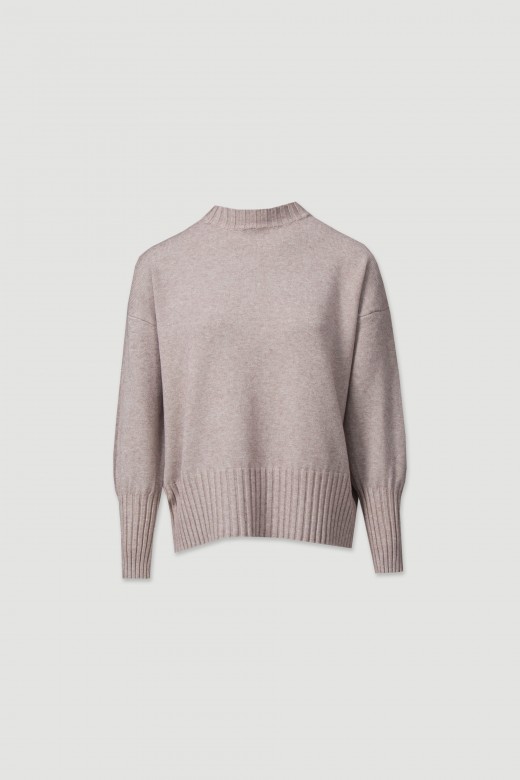 Pull en maille avec poignet haut.