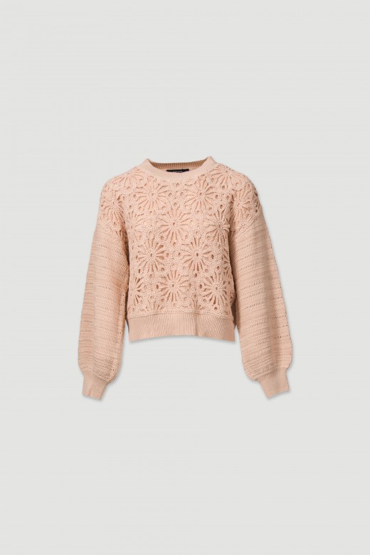 Knit sweater with a crochet effect