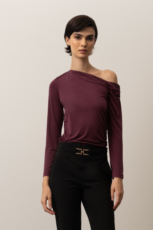 Knit sweater with an asymmetrical neckline and draped detail