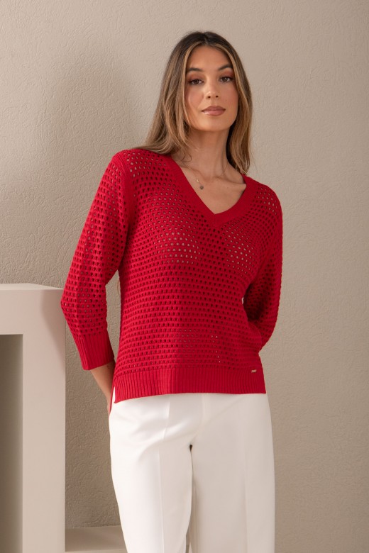 Asymmetric perforated knit sweater