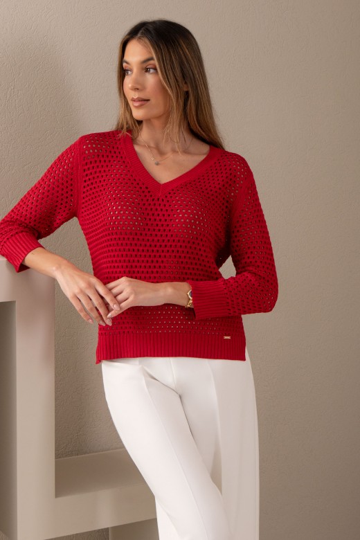 Asymmetric perforated knit sweater
