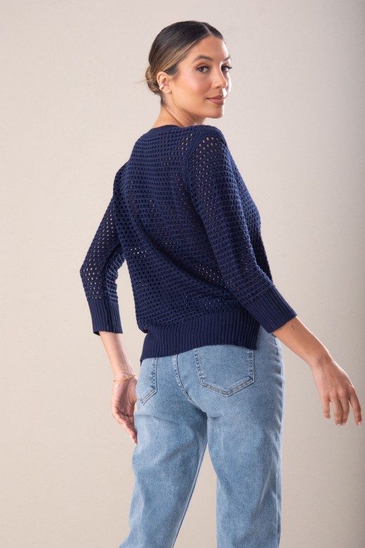 Asymmetric perforated knit sweater