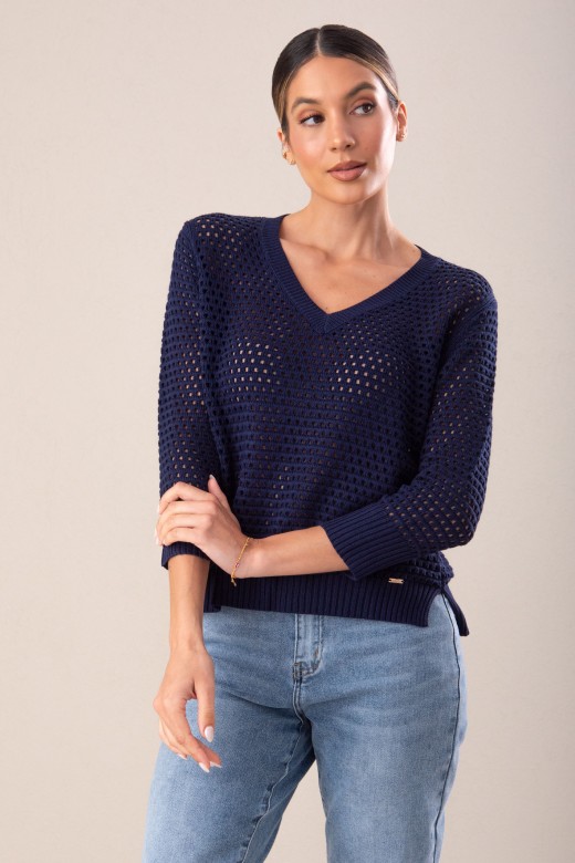Asymmetric perforated knit sweater