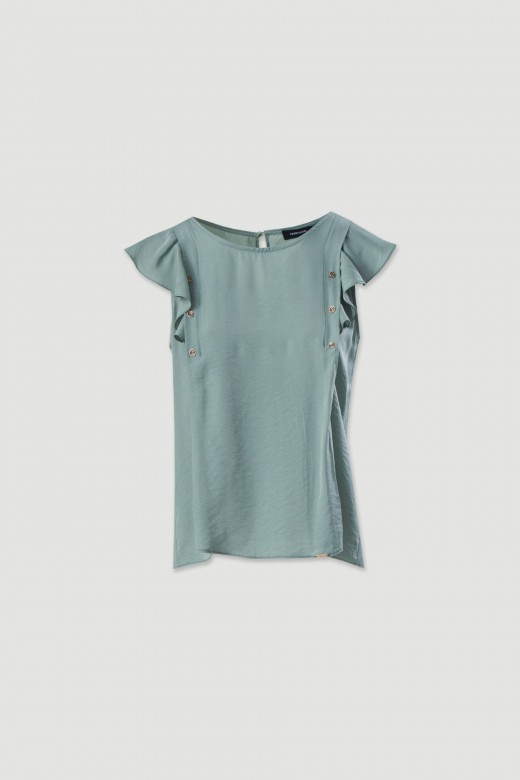 Blouse unie avec volant sur la manche