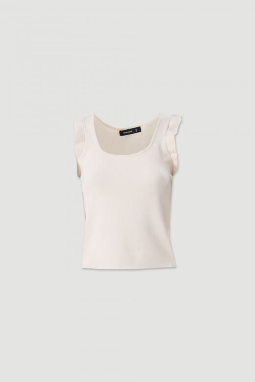 Top em malha com detalhe de folho