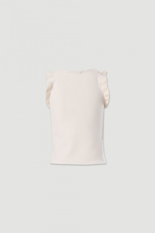 Top em malha com detalhe de folho