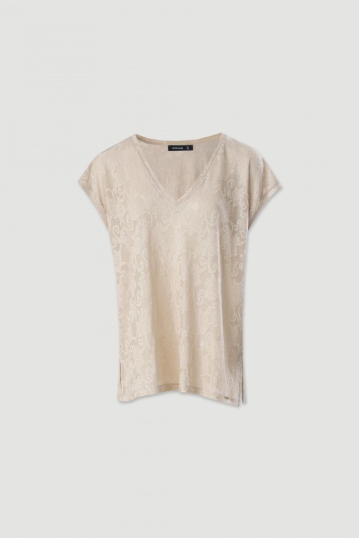 Tunic with embossed floral pattern