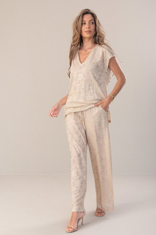Cala wide leg fluda com padro floral em relevo