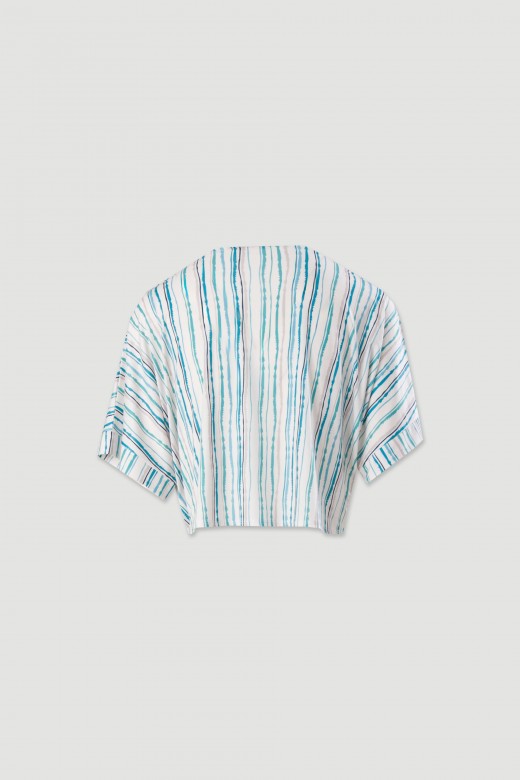 Tnica curta em malha fria estampada com lao